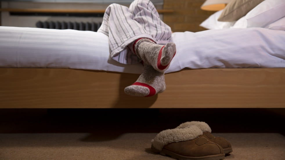 cosy bed with socks and slippers